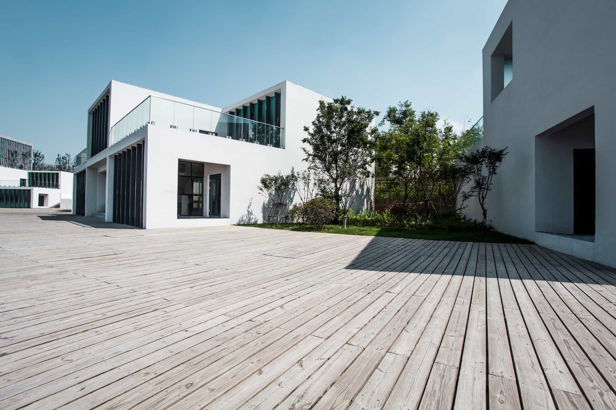 minimalist-modern-architecture-with-wooden-deck-un-2026-03-09-21-45-50-utc.jpg